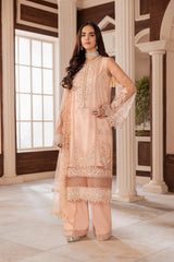 Woman wearing peach embroidered formal dress with dupatta, LA ELISE fashion collection