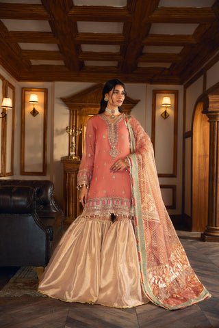 Woman in peach embroidered formal Pakistani dress with dupatta, LA ELISE fashion collection