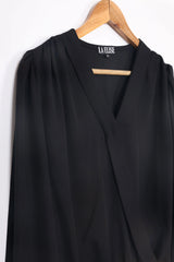 Black V-neck women's dress by LA ELISE on wooden hanger, stylish and ready-to-wear